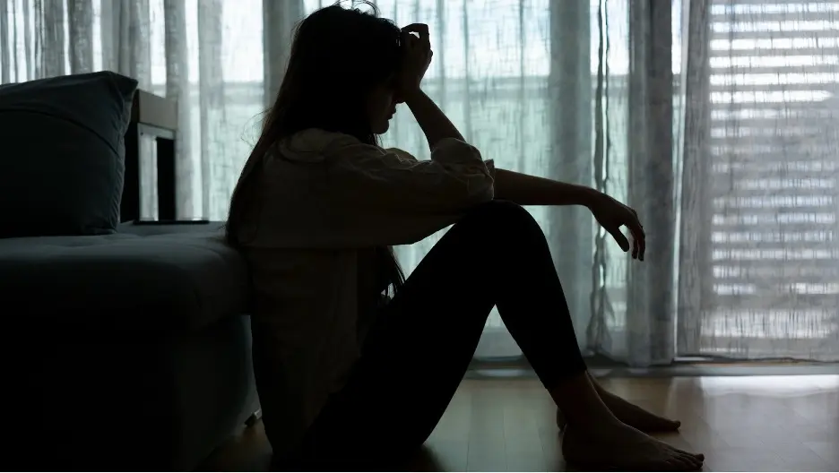 A person sitting on the floor